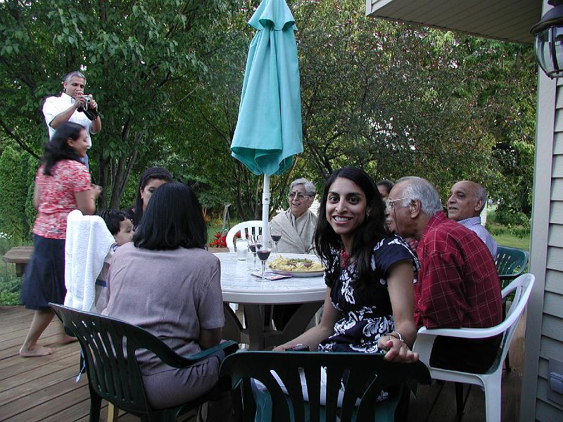 P7040003.JPG - Premjit taking a photograph with Aditee being anti photo