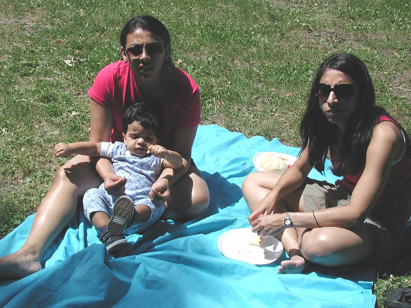 P7050040.JPG - Rohan is more interested in his food than his aunts.