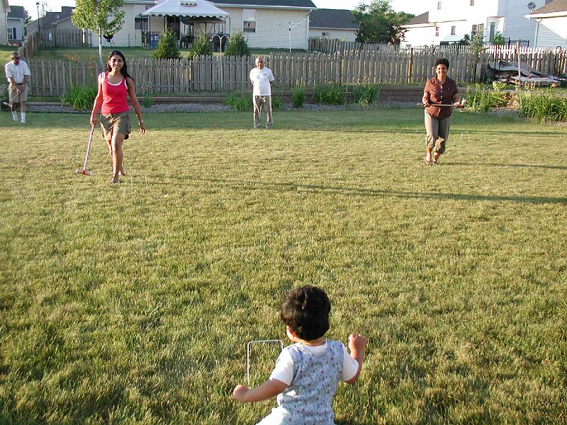 P7050060.JPG - Crocquet is a very fast and exciting game. Here the players are returning all sweaty and tired.