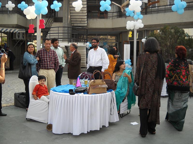 DSCN0192.JPG - More family pictures though you can see the backs of many people.