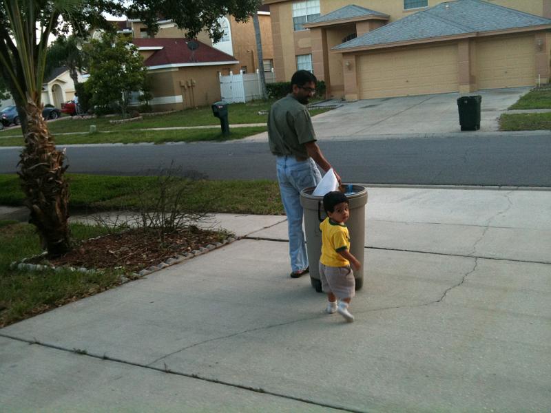 IMG_0219.JPG - The diapers are in the trash can and the can is on the way to the curb