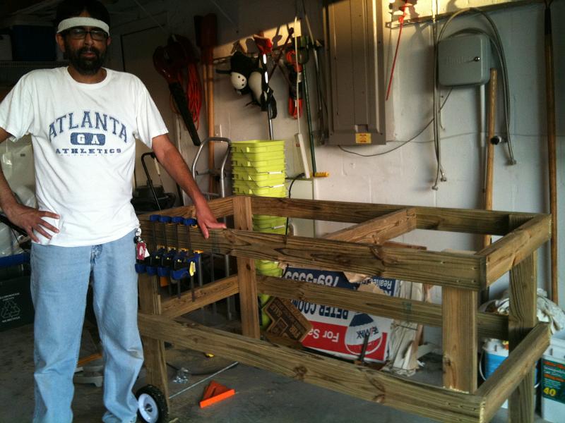 IMG_0220.JPG - What is this? This is a table being built. That morning about 1:00am we had rushed Rohan to the emergency room. He had a fever of 103 but was shivering. At the ER they diagonised an ear infection gave him tylenol and antibiotic and sent him home. We got about 3 hours of sleep. Since Rohan's fever came down by 4:00pm I started on my project to build this table. Why the table you will see later.