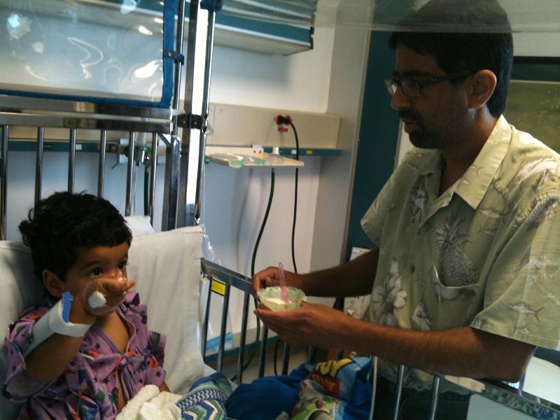 IMG_0232.JPG - Eating some ice cream. The pediatric floor had a room that was filled with snacks (chips ect) and other things like ice cream and popsicles etc inaddition to the usual tea, coffee and hot chocolate.