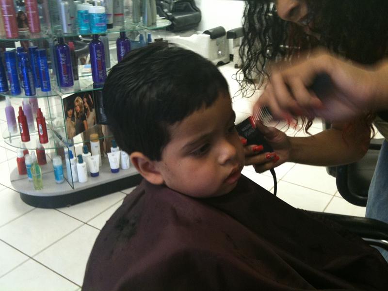 IMG_0285.JPG - He did not like the hair cut but he had it.