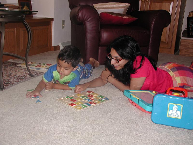 P7040005.JPG - Closer view of Rohan and aunt in pajamas