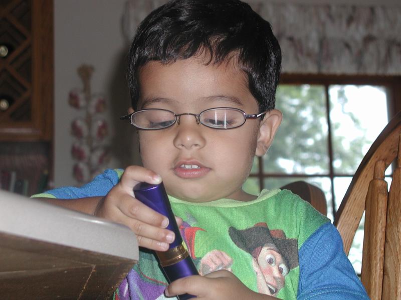 P7040010.JPG - He is intent on getting the case back together