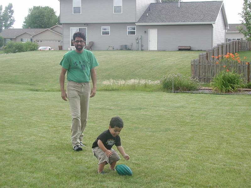 P7040014.JPG - Rohan and father playing with the ball in Kavitha's backyard