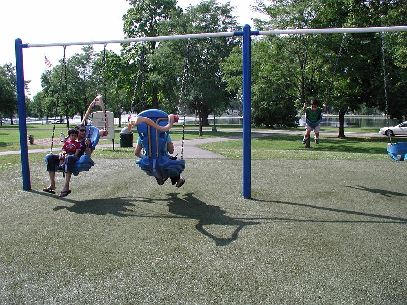 P7070053.JPG - And that is Ronan in Aditee's lap. Rohan is on the swing by himself