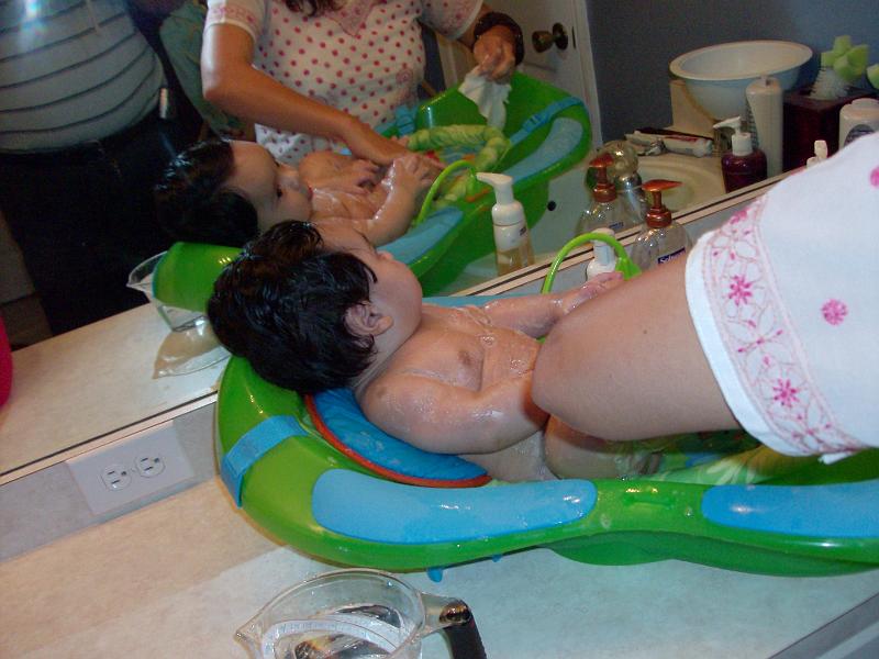 HPIM0972.JPG - Aaaaahhaaaa - The joys of a warm soapy bath. Rohan at bath time is just like the 5 cats. He likes the bath until it comes time to put water on his face.