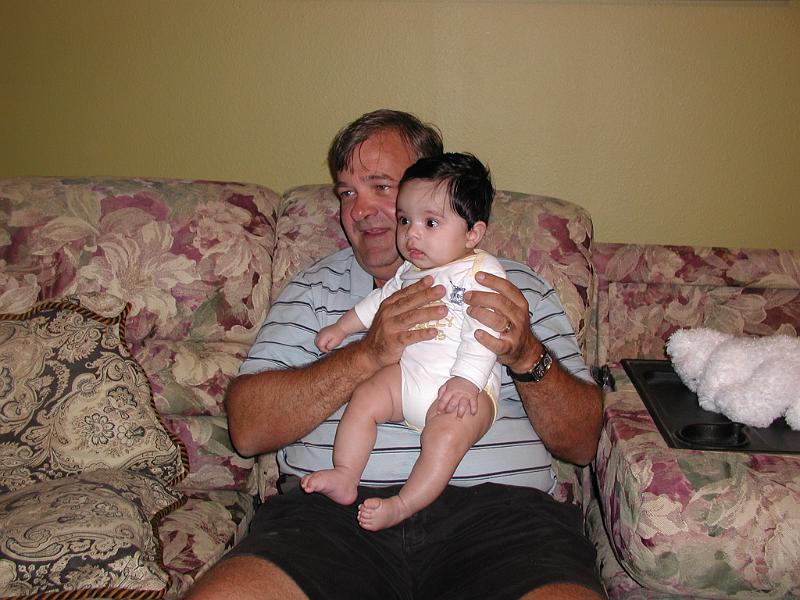 PA130010.JPG - Fotis Mouzakis holding Rohan. Fotis is Rohan's Godfather