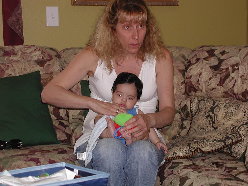 PA190029.JPG - Rohan is comfy in Sylvia's lap