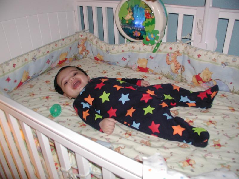 PA190043.JPG - Next he tries the mattress in his upstairs crib