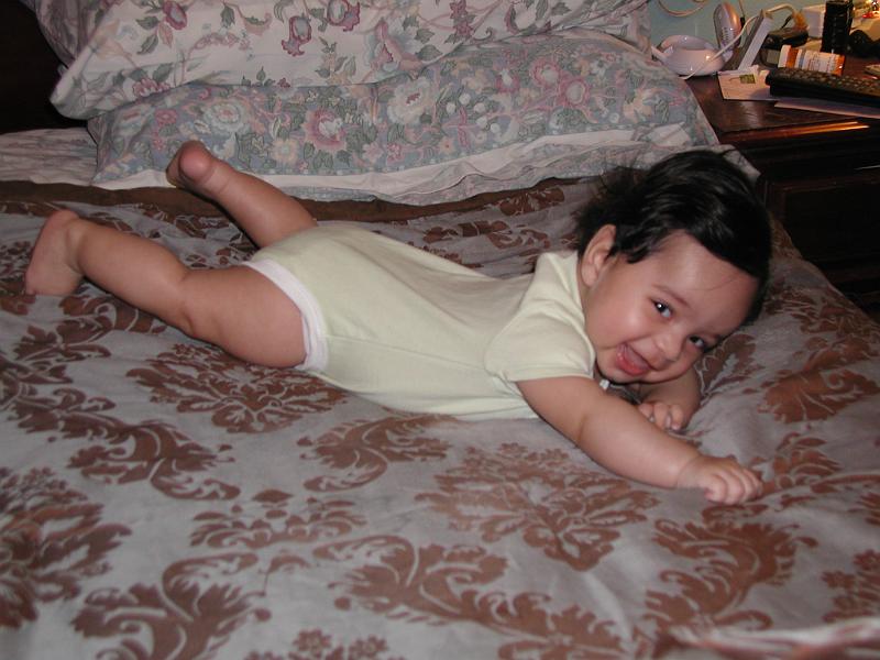 PA220051.JPG - Rohan cannot crawl yet. He has just started to turn over from his back to his tummy. He cannot go the other way from his tummy to his back