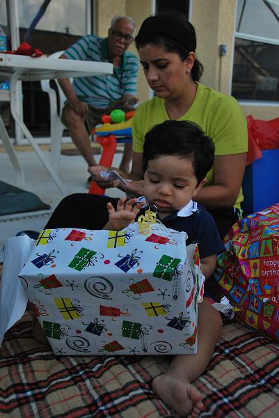 DSC_0775.JPG - Tearing the wrapping