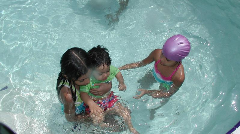 P5260045.JPG - Rohan being man handled by his cousins