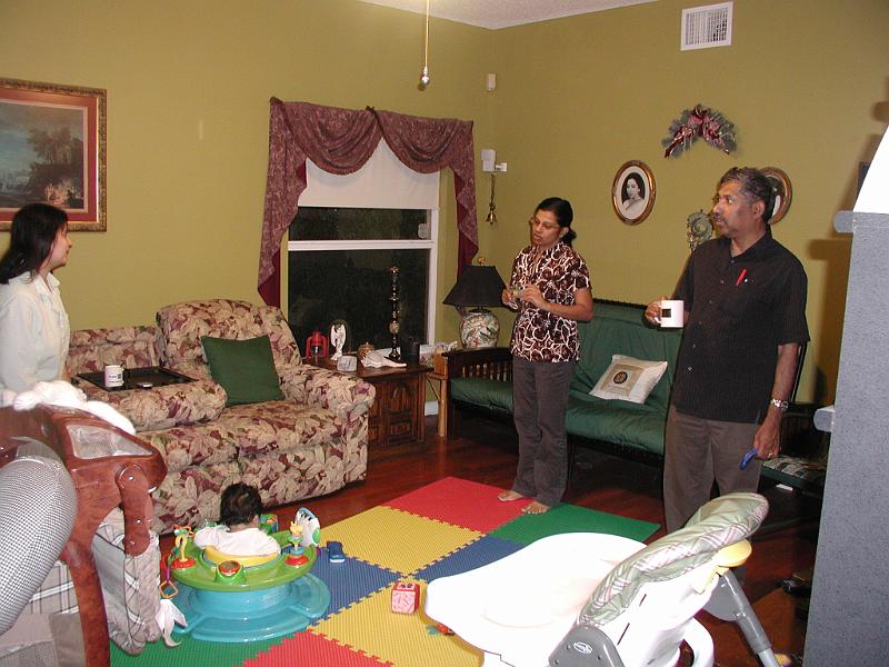 P1010094.JPG - Dhanya and Vinod. You also see Devika and the back of Rohan.