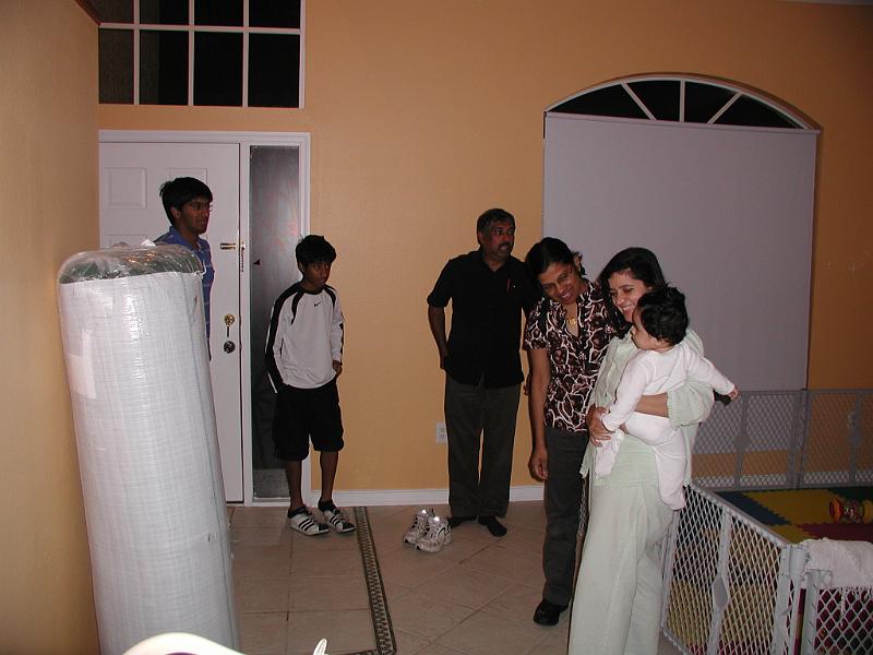 P1010096.JPG - Dhanya and Vinod and sons about to leave.