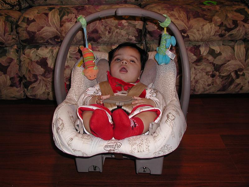 PC040001.JPG - Since it was close to Christmas, Rohan was dressed as Santa Claus. It looks like Santa Claus is very sleepy