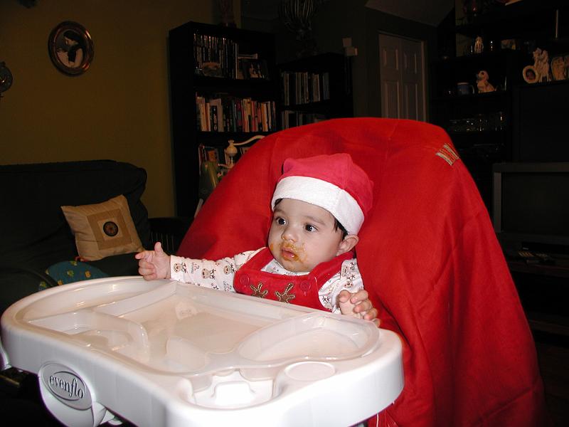 PC040022.JPG - Not enough color on Santa so he decided to put some food on his face