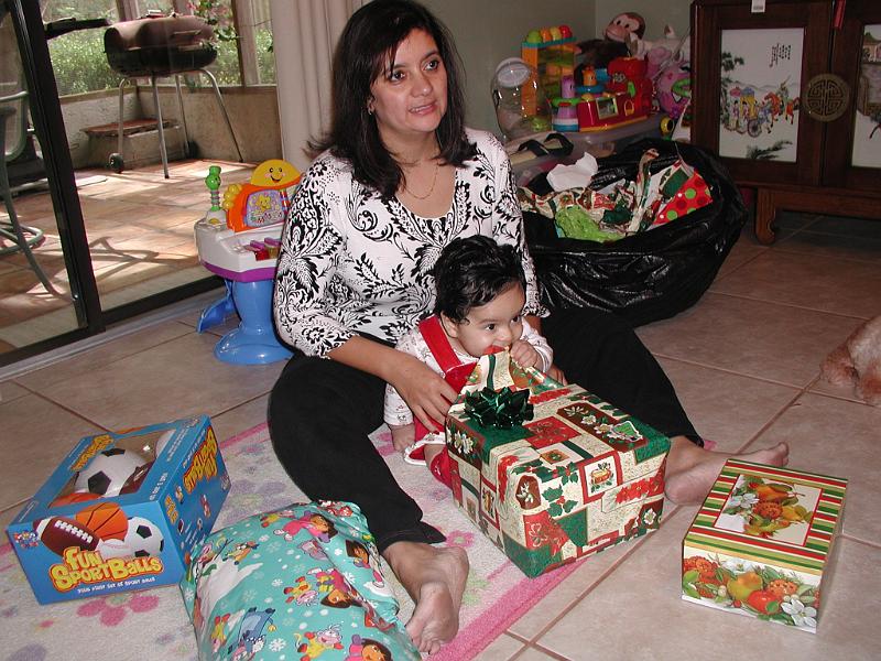 PC250082.JPG - Rohan eating the gift wrapping. To him that is the present. The box exists merely to be wrapped