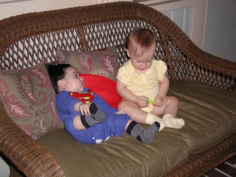 PA310019.JPG - Superman and Hannah and a peice of celery