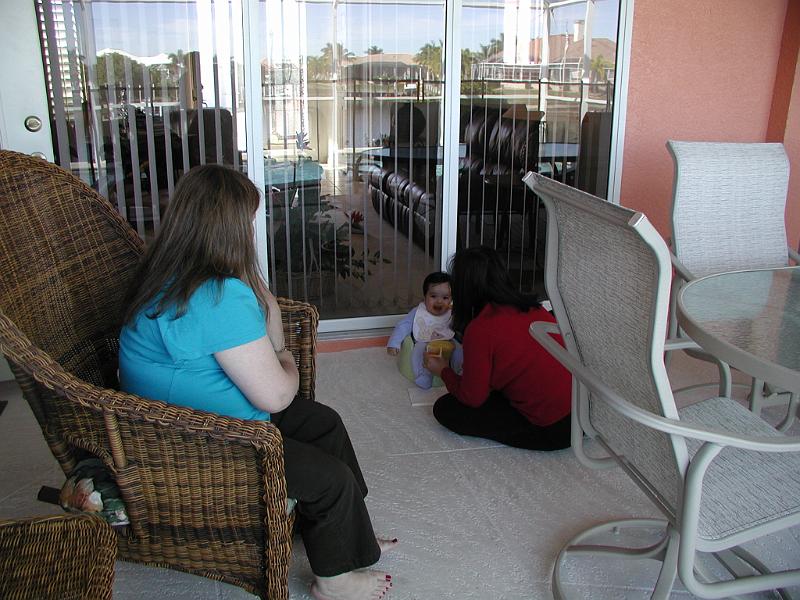 PB270066.JPG - Thanksgiving was November 27. We went down to Stephanie's Mom's place which is at Punta Gorda  which is about 120 miles south of Tampa. In the picture you see Stephanie, Devika and Rohan.