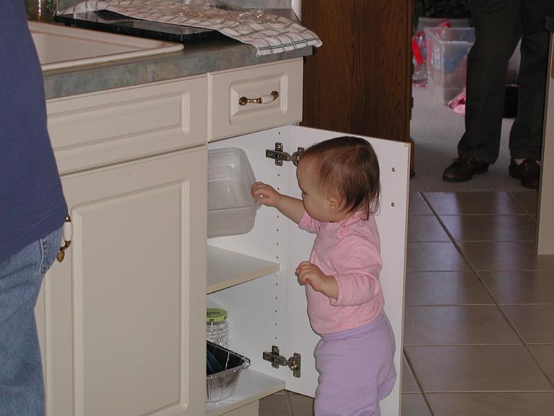PB270070.JPG - And here is Hannah rearranging her grandmothers cupboards