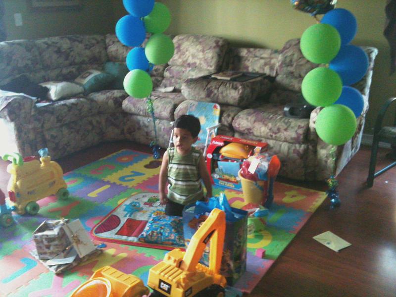 IMG_0364.JPG - Once home he started to open his presents.