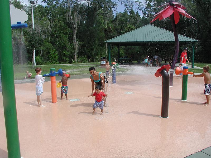 P8230134.JPG - Rohan and his mother at the spray park. This is a public park near home where the kids can play in the water and the fountains. Its is ideal when the temperature is 35 degrees centigrade and the humidity is 95%