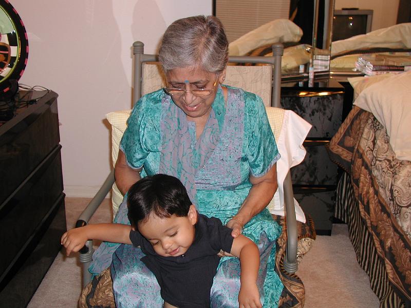 P9020174.JPG - Grandmother trying to put him in her lap