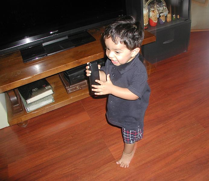 P9020200.JPG - His favorite toy - the phone